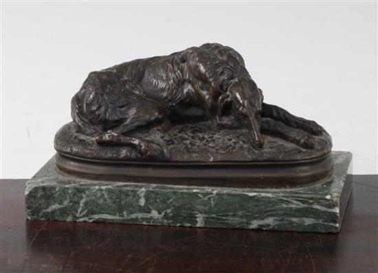 After Paul Joseph Raymond Gayrard. A bronze model of a recumbent deerhound, 6.5in.